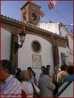 Outside the local church in Benamocarra